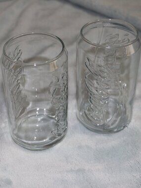 Vintage collectors embossed Coca Cola glass set. Set of 7.